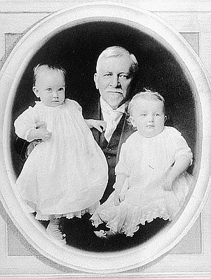 Portrait of Henry Pittock with Two Babies